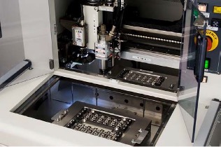 Fig. 5 Jigs on a turn table